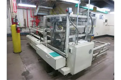 Elliot case erector w/ 9.5' x 7' Feed, 460V, 3 Ph
