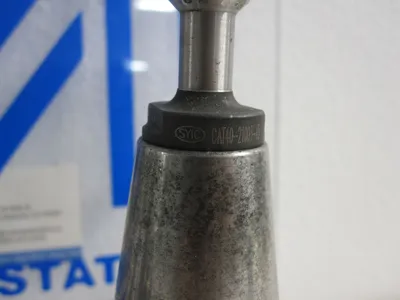 USED BRINEY CAT40
