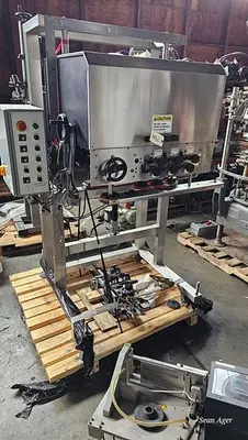 A Packaging Systems Inline Capper
