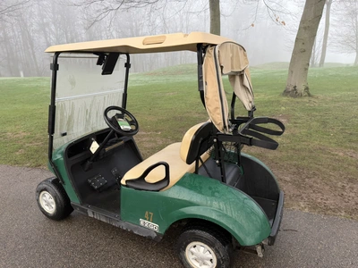 (1) 2017 E-Z-Go golf cart with a Kawasaki gas engine, model 625111G01, includes canopy, ball cover, ...