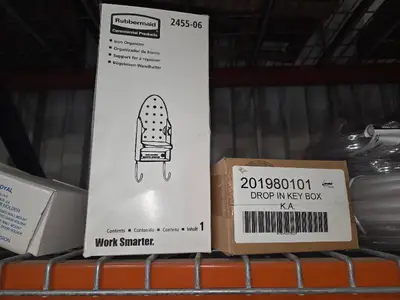 Shelf of magnetic door holders, hose, cords