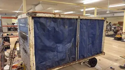 Used Airline Cargo Container with Team USA Graphics and Rolling Base