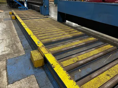 51' Powered Floor Mounted Exit Conveyor