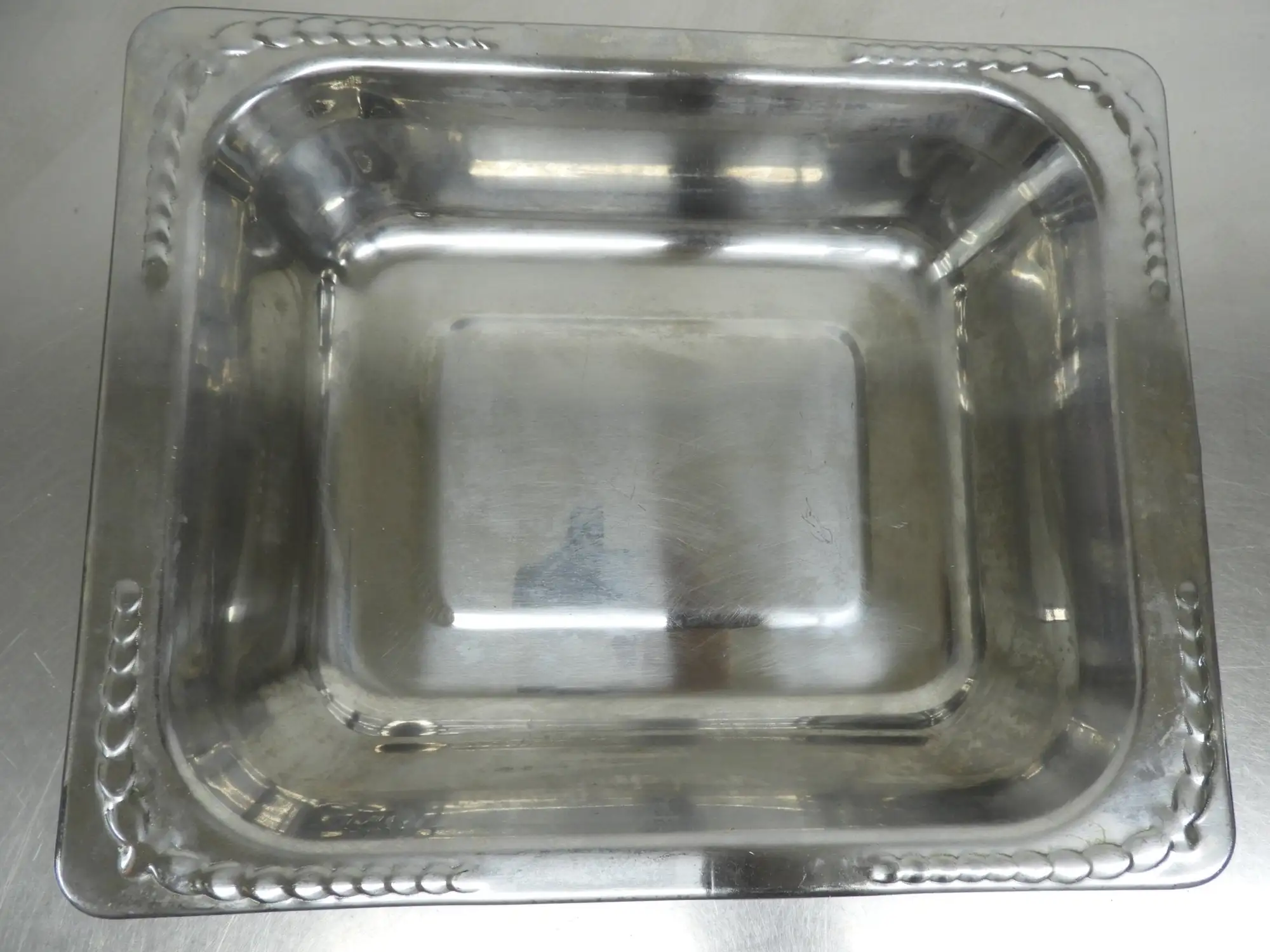 Used Golden Corral Used Vollrath 8230720 Miramar 3.4Qt Rectangular Decorative 1/2 Size Food Pan Steam Pans Illinois US | Falcon Restaurant Supply #1376480