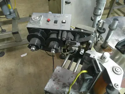 CVC pressure sensitive wrap labeler