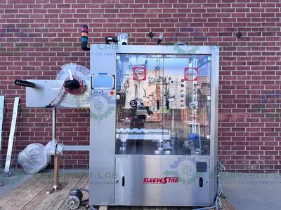 USED CAPMATIC SLEEVESTAR 300 FULL SLEEVE STAINLESS STEEL LABELING MACHINE