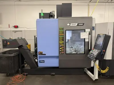2023 Doosan Mdl DVF-5000 5 Axis CNC Vertical Machining Center w/ 12 Pallet AWC