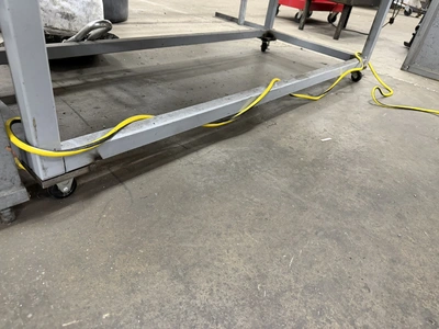 (1) heavy duty, 3-tier steel rolling rack, 60" length x 24" width x 38" height.