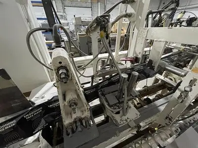 Bartelt model IM7 Pouch Packager with AMS Auger Filler and  liquid filler