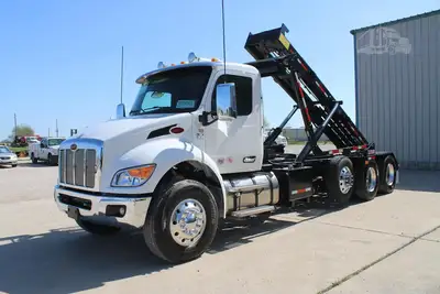 New | in-Stock 2027 PETERBILT 548 Rolloff Trucks Texas US | Roll Off Truck World #1492012