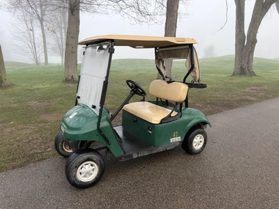 (1) 2017 E-Z-Go golf cart with a Kawasaki gas engine, model 625111G01, includes canopy, ball cover, ...
