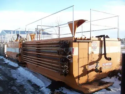 USED 20 M3 (120 BBL) SKID MOUNTED 2 COMPARTMENT MUD TANK