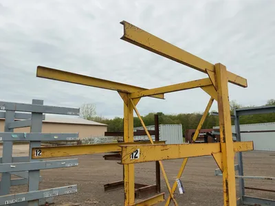 Metal Two Sided Cantilever Rack, welded together, arms stick out 47” on one side and 27-1/2” on othe...