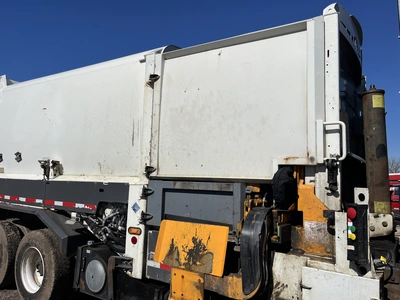 USED 2013 MACK LEU633 REFUSE PACKER BODY WITH AUTO ARM.