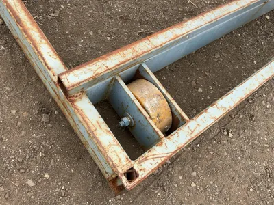 Metal Two Sided Cantilever Rack, on wheels so it can roll sideways, welded together, arms stick out ...