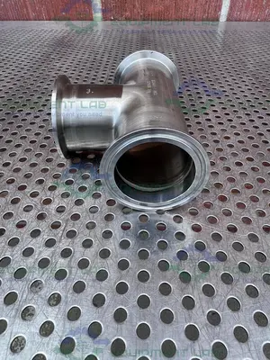 USED 3 WAY 316L STAINLESS STEEL TEE W/ 2" SANITARY FITTINGS & 2" CENTER