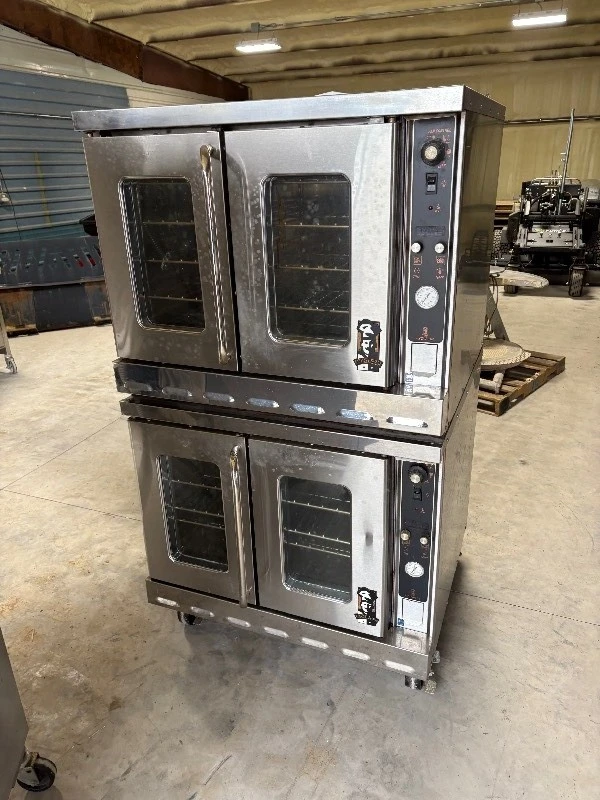 Heavy-duty commercial convection ovens in a stacked configuration