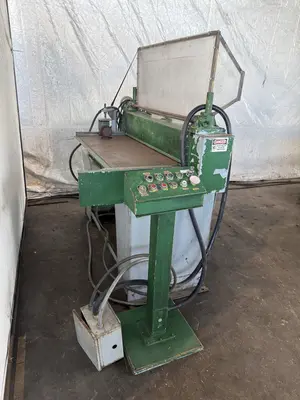 48” X 4" ARBOR STRILICH SLITTING LINE WITH FAMCO CUT OFF SHEAR & AMS CONTROLS. STOCK # 0664425