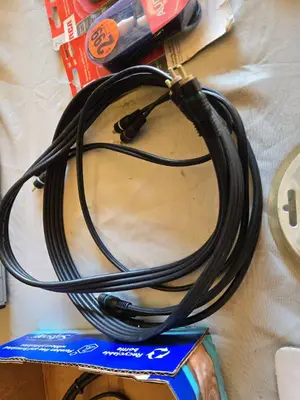 Various audio, video, and network cables, including RCA stereo audio cables, CAT6 network cables, VGA extension cables, USB printer cables, and more.