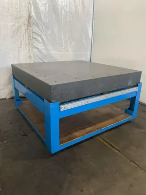 60" X 60" X 8-1/4" GRANITE SURFACE TABLE. STOCK # 1165023.