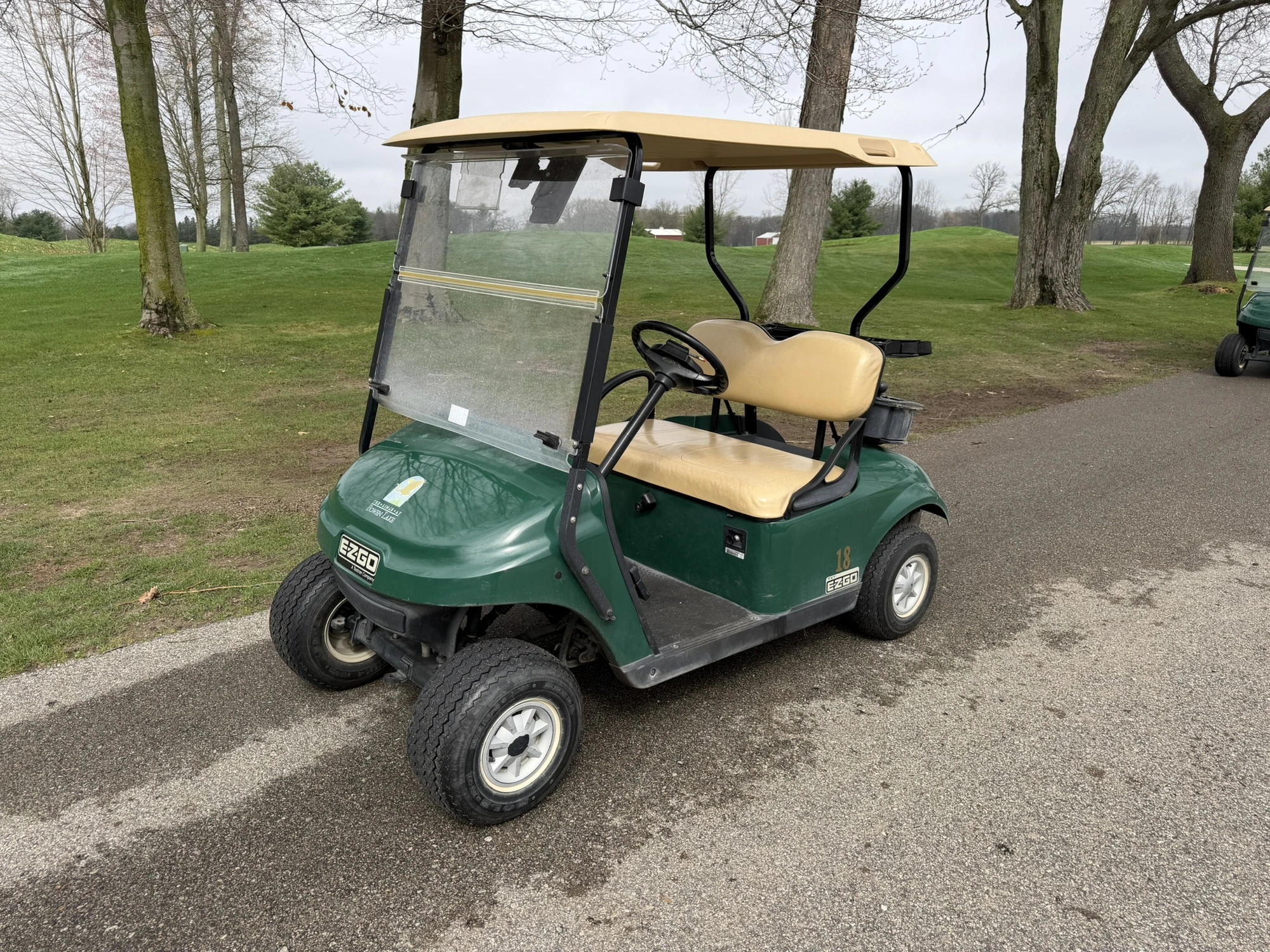 (1) 2015 E-Z-Go golf cart with a Kawasaki gas engine, does not include Club canopy, includes ball wa...