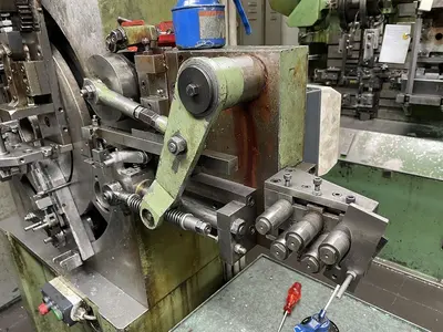 USED BUCH DCM-200 4/40 SPRING MAKING