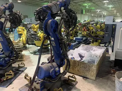 Used YASKAWA MOTOMAN ES165D 6 AXIS CNC ROBOT WITH DX100 CONTROLLER WITH SPOT WELDING GUN Robots | Harbor Machinery Inc. #1283329