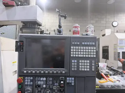 USED 2013 OKUMA L300E-M