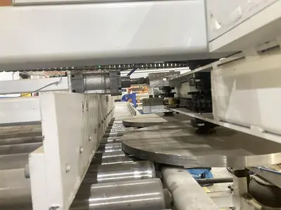 CONVEYOR WORK-PIECE LATERAL POSITIONER/EVEN-ENDER