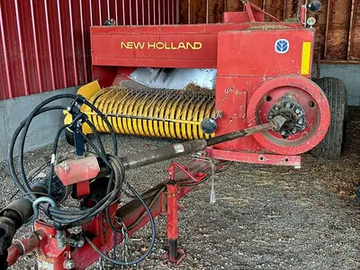 USED 2003 NEW HOLLAND 580