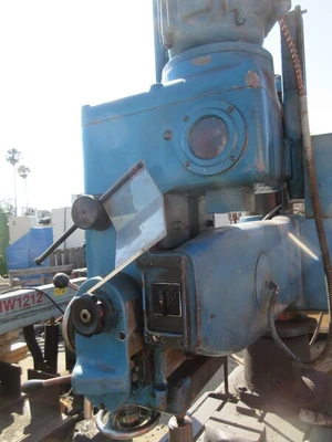 Caser, radial arm drill press