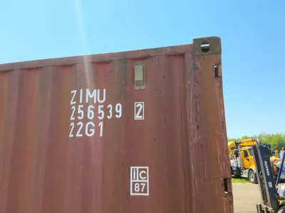 20’ Shipping / Storage Container 8’ wide x 8’ 6” tall, swing doors on one end, wood deck, rings for ...