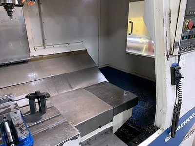 Used 2001 DAEWOO MYNX 530 Vertical Machining Centers Illinois US | Machinery Marketing International #378975