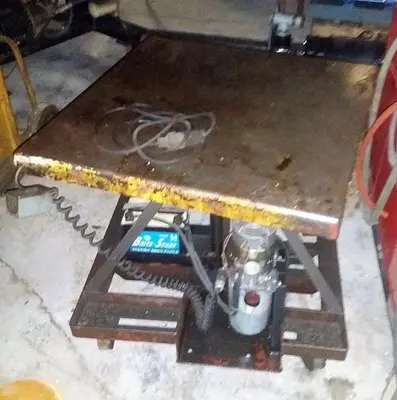 USED BARNES ROTARY LIFT TABLE