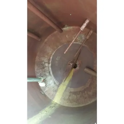 USED STAINLESS STEEL LIQUID HOLDING TANK WITH AGITATOR - 70 GALLON CAPACITY
