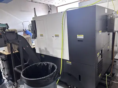 Used 2021 OKUMA GENOS L400II-E CNC Lathes Illinois US | Machinery Marketing International #1407233