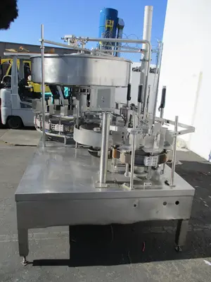Gravity feed, 1 gallon bottle filling machine w/ 24 heads