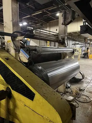 USED BLACK CLAWSON CHILLED ROLL STATION WITH (2) CHILLED ROLLS