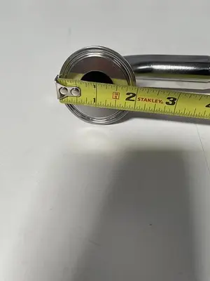 USED TSC 17" HOSE W/ 2" SANITARY ELBOW FITTING AND 1" SANITARY FITTING