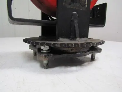 08300-11-24 1" bore caster wheel 9-7/8" OD w/steering sprocket and bracket