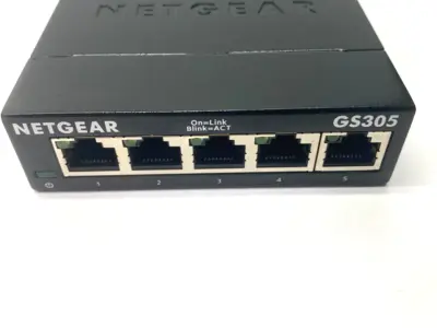 Used Netgear Gigabit Ethernet 5-Port Unmanaged Switch 10/100/1000Mbps 5V .7A Network Switches Michigan US | Maverick Industrial Sales #1393266