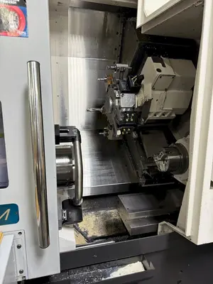 USED 2016 OKUMA GENOS L300MYW