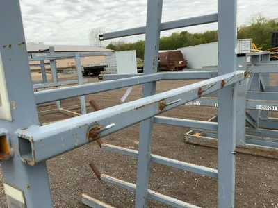 Metal 8-Tier Cantilever Rack, welded together, arms stick out approx. 20” and have metal brackets th...