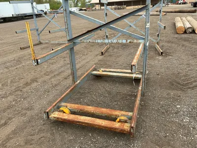 Metal Two Sided Cantilever Rack, on wheels so it can roll sideways, welded together, arms stick out ...