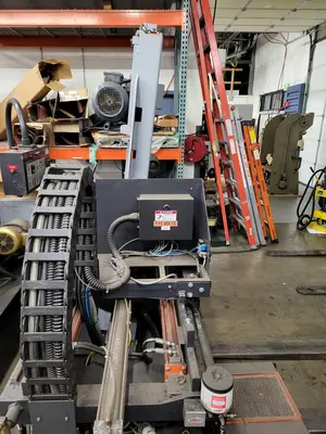 HE&M Vertical Bandsaw V100LM-45 with Infeed/Outfeed Conveyors