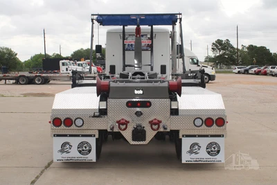 Used 2027 PETERBILT 548 Hooklifts & Roll-Offs Texas US | Roll Off Truck World #1491992
