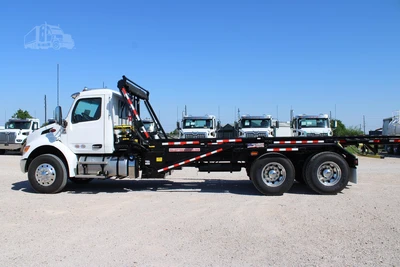 New | in-Stock 2027 PETERBILT 548 Hooklifts & Roll-Offs Texas US | Roll Off Truck World #1492004