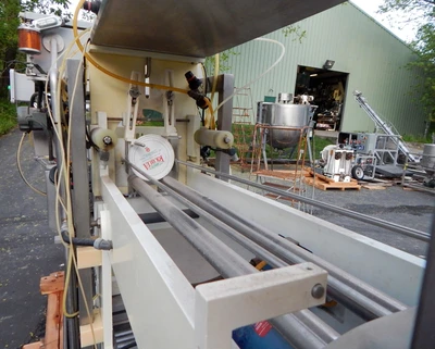 USED AKRAPAK CUP FILLER SS