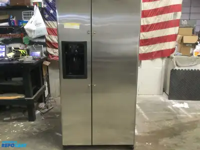 USED GE STAINLESS STEEL AND BLACK SIDE X SIDE REFRIGERATOR HEAVY DUTY ENERGY STAR