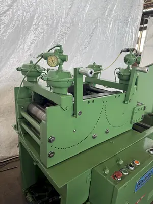 8,000 LB X 18" X .187" REGAL COIL CRADLE & STRAIGHTENER. STOCK #1227024